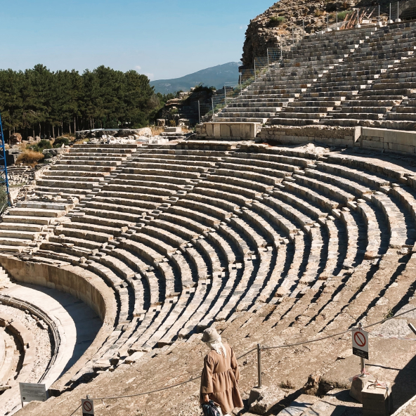 The ancient theatre of Ephesus in Turkey, showcasing its impressive stone structure and historical significance.